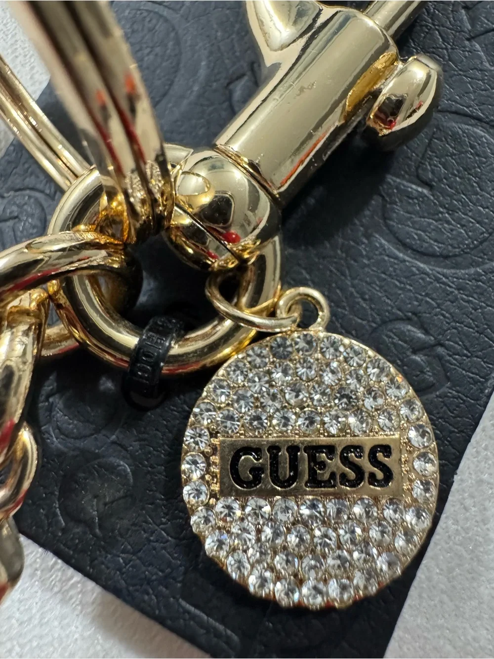 GUESS Cherry Bag Charm and Keychain in Gold Tone